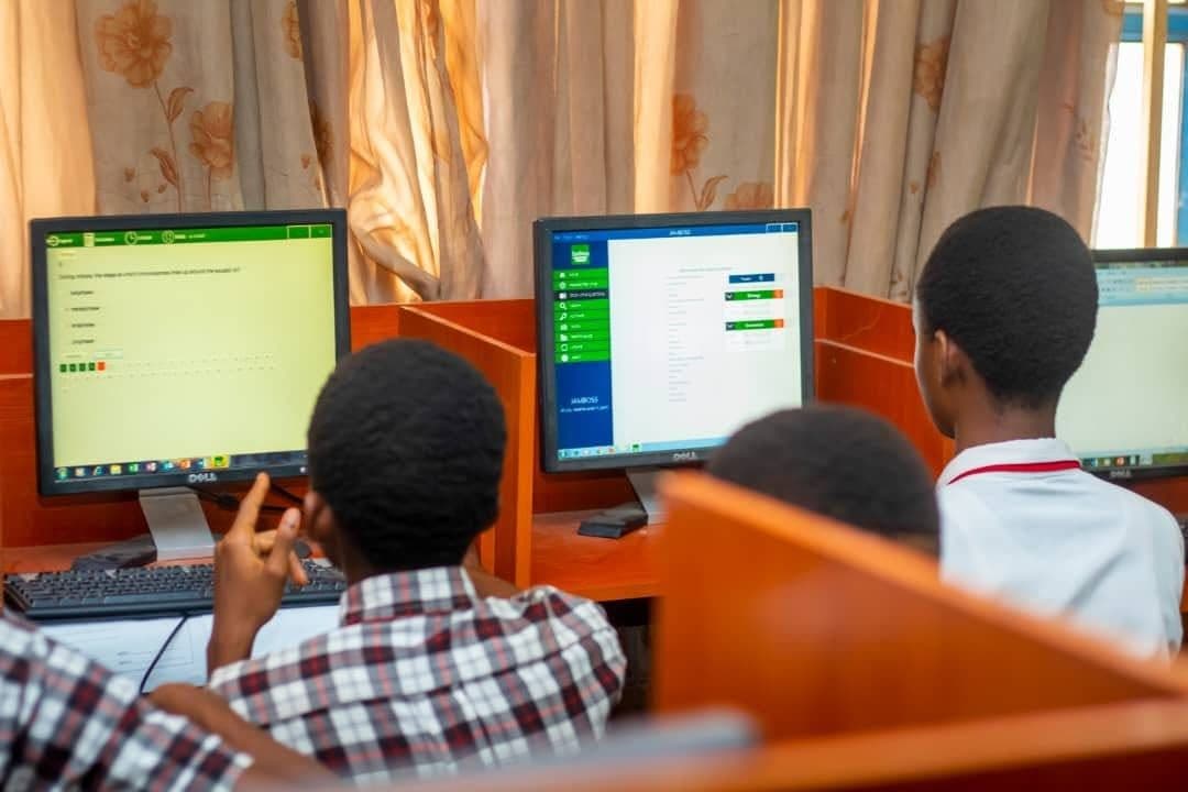 Students coding on computers in a lab